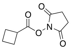 1-[(Cyclobutylcarbonyl)oxy]pyrrolidine-2,5-dione