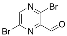 3,6-Dibromopyrazine-2-carbaldehyde